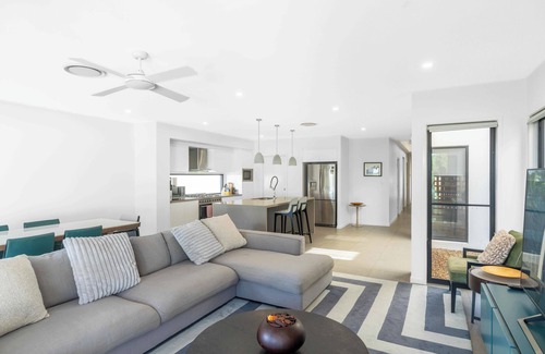 Helensvale House | Waterfront Wonder - Pool, Views & Luxury Stay