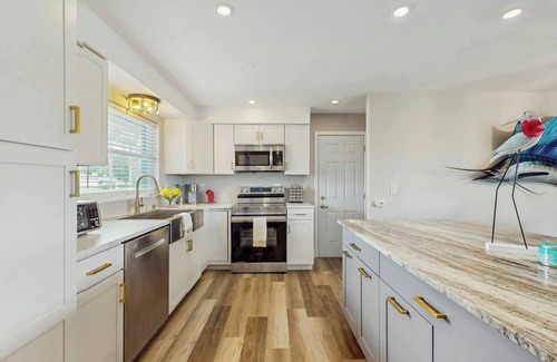 Caloosahatchee House | Waterside Paradise 3-bedroom, 2 bath, with pool & hot tub in Cape Coral