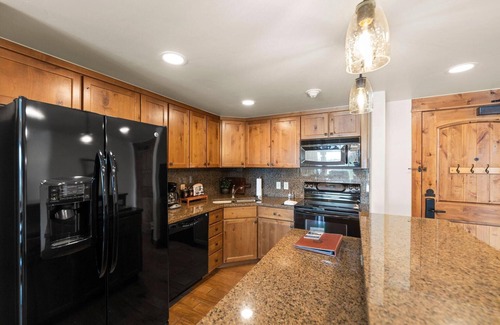 Tamarack Condo | Welcoming Condo|Fireplace and Patio