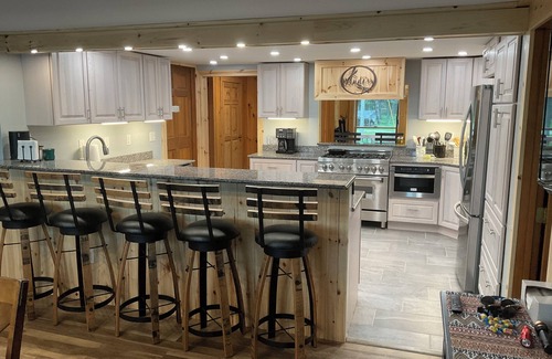 Lewiston House | Welcoming lake house with five bedrooms and a huge deck on Tee lake in Lewiston.