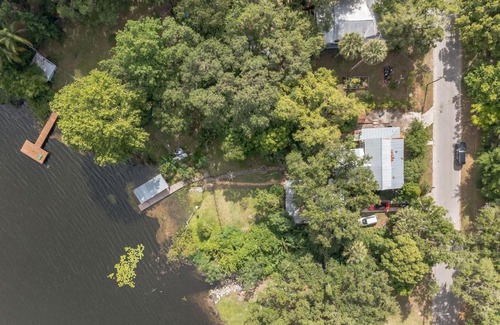 Crescent City House | West Stella Lake House with Outdoor Pool Table & Fireplace residence