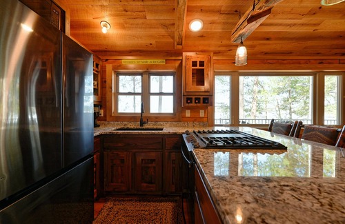 Spooner Cabin | Western exposure with sand frontage