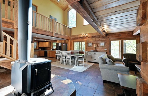 Iron River Cabin | Whispering Waters Lodge with Waterfall, Pond and Trails on Property in Delta, WI