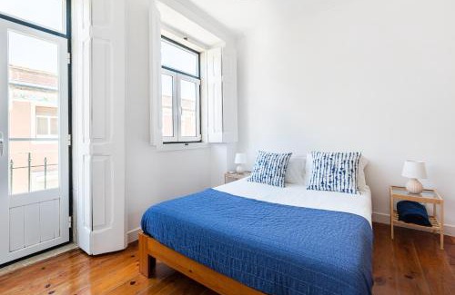 Alfama Apartment | White & Blue Vintage Home in Graça