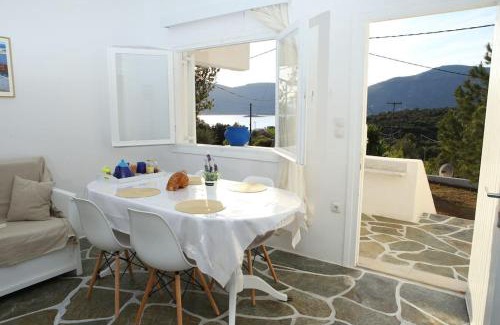 Steni Dirfyos House | White Villa in Olive trees and Seaview to Panagia
