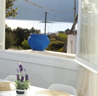 Steni Dirfyos House | White Villa in Olive trees and Seaview to Panagia