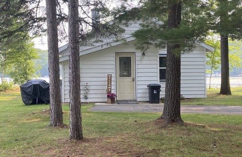 Rhinelander Cottage | WI River-Boom Lake cottage on spacious lot, water on 3 sides, kayaks, fire pit