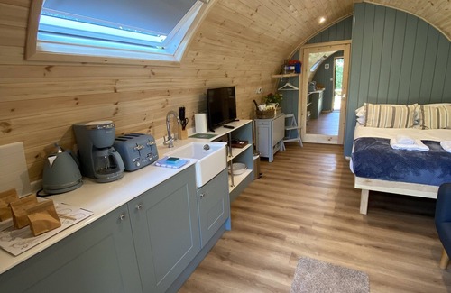 Newton Ferrers Cabin | Wild Luxury Bluebell Glamping Pod with Wood Fired Hot Tub in quiet rural setting