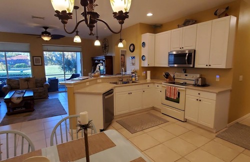 Burnt Store Marina Villa | Winter 2026 - Enjoy an EZGO Golf cart with your 2026 winter rental at our Villa