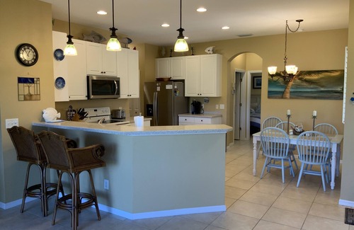 Burnt Store Marina Villa | Winter 2026 - Enjoy an EZGO Golf cart with your 2026 winter rental at our Villa