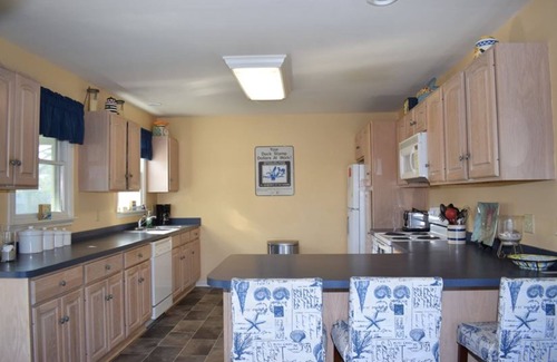 Deep Hole House | Wishful Thinking- Beautiful Home, Quiet Community, Canal Front w/Boat Dock