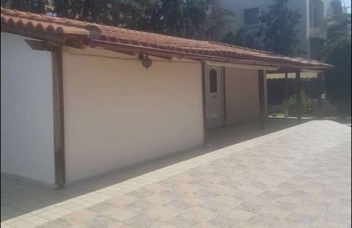 Kineta House | Wooden house next to the sea