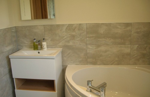 Hundred House Cabin | Woodland Lodge - A Five star luxury lodge with hot tub under cover.