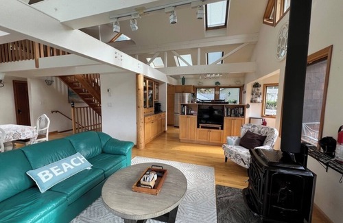 Fanny Bay House | Wraparound Deck w/Ocean and Mountain Sunset Vista