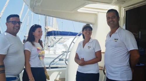 Santa Cruz de Tenerife Boat Rental | Yacht Experience Tenerife 24h plus Tour with private Skipper & private Hostess all inclusive with Cocktails, Sandwiches, free Minibar and free islandwide pick-up and return in a Tesla S Sportscar