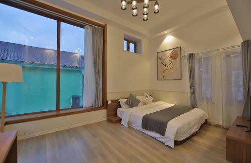 Yanji Hotel | Yanji May Lilac Homestay Village