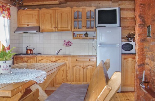 Darlowo House | Year-round habitable wooden house with thatched roof.
