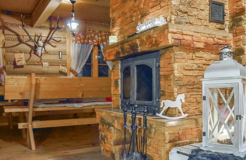 Darlowo House | Year-round habitable wooden house with thatched roof.