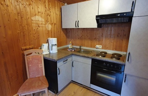 Ilmenau Apartment | Yellow bungalow 317 weekly package 7 nights - Naturcamp Meyersgrund -
