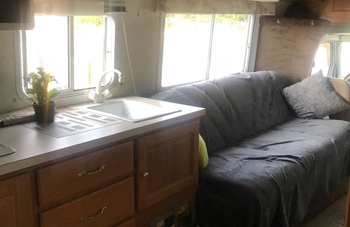 Downtown San Jose Apartment | Your home away from home on wheels small Rv with room for two with small kitchen