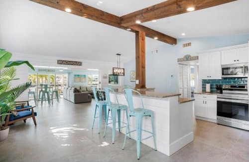Bahia Vista House | Your Waterfront Family Compound - Free Golf Cart, Paddleboards, Heated Pool