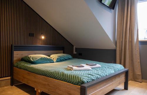 Ouddorp House | Zeeschelp - Comfortabele kamer bij B&B Gezond aan Zee - Toegang Wellnesstuin meerprijs