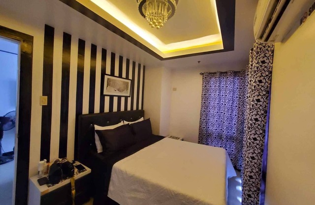 1-bedroom condo in brilliant Manila with AC, fitness room, WiFi