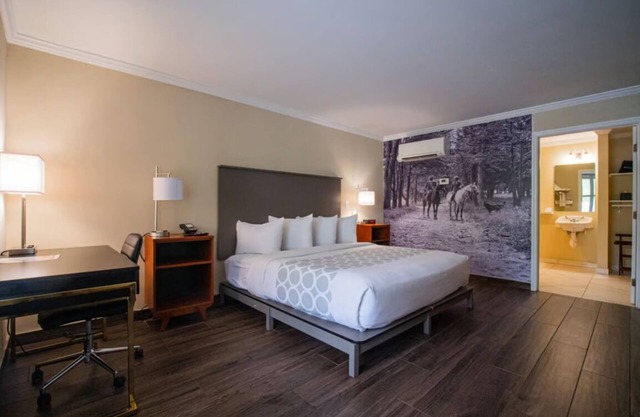 1 Queen Suite at Equus Inn, Pets Allowed, Seasonal Pool, Free Breakfast