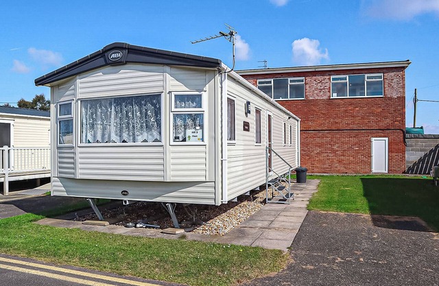 12ft-wide stylish and comfortable caravan with one double and two twin.