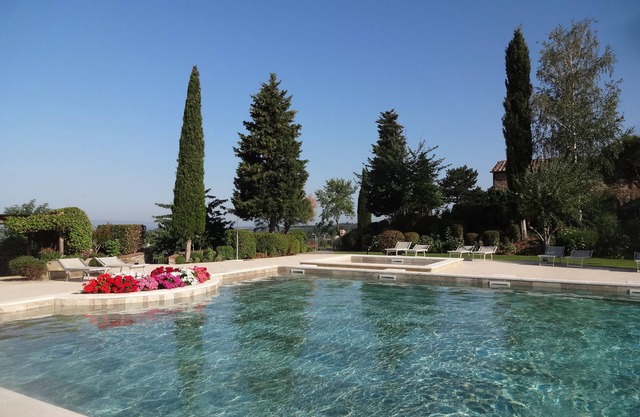12km North of Siena with a stunning view pool & tenniscourt 3 bedrooms ensuite