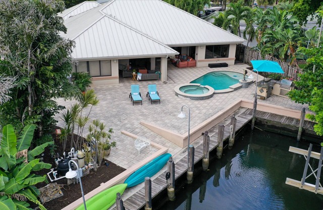 144' New River Dock DT! Sailfish Pool, Hot Tub, Pontoon & Fire Lounge Luxury!