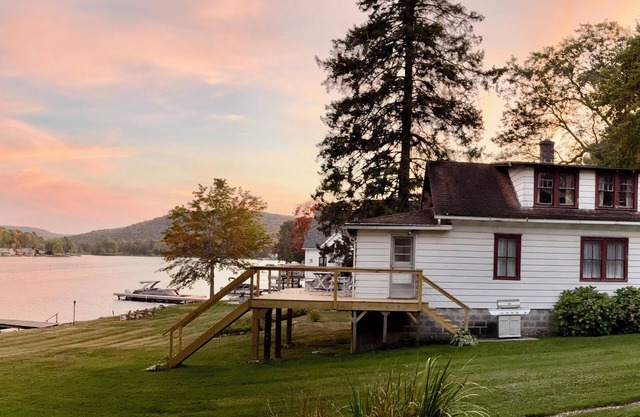 1920s Cuba Lake Cottage with 3 bedrooms and one bathroom, large yard, and dock.