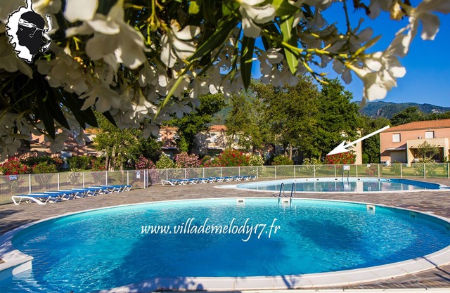 * 2 air conditioned mini villa overlooking pools and garden, 500 m beach, for 4 people