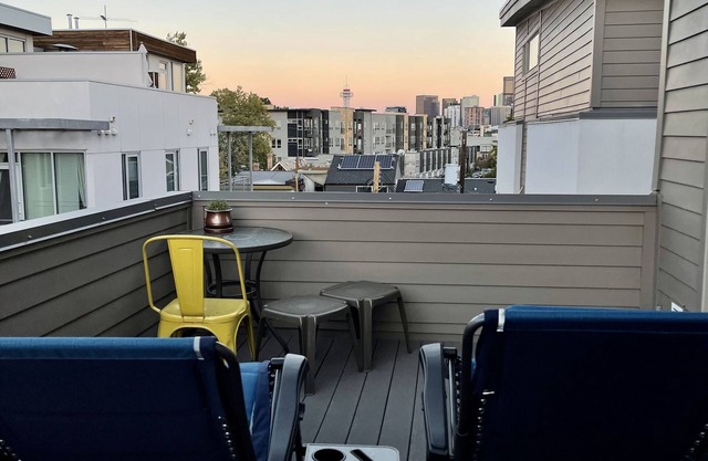 2 bedroom townhome w fire place & rooftop deck.