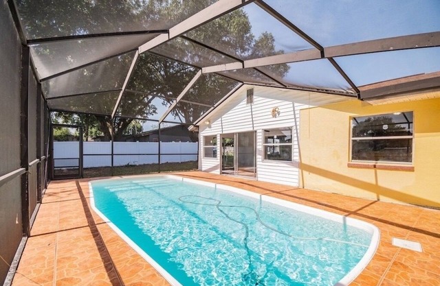 2 houses 5bed 4bath heated pool prime location
