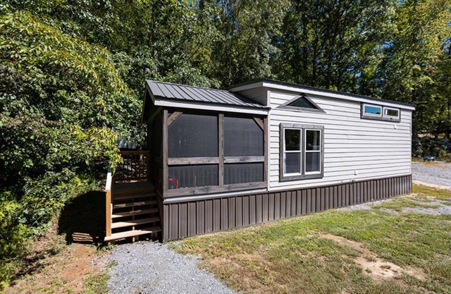 2-story tiny home nestled on the creek, quick walk to pool and playground, private firepit, sleeps 7.