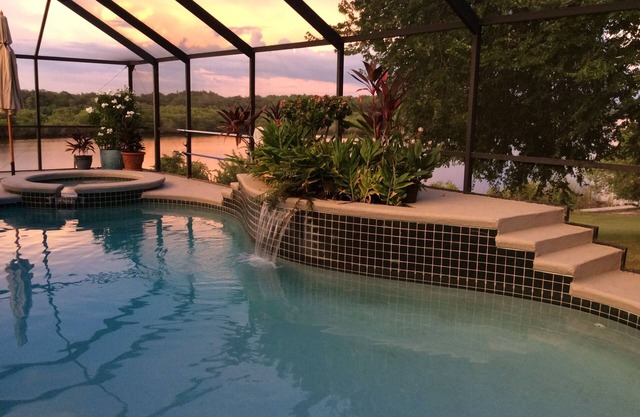 3 acres private 4 bed, 4 bath ranch, unusually huge lanai, heated pool, grill!