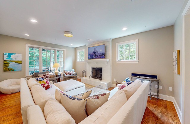 3-story home near river with patio, firepit, Ping-Pong, grill and wood fireplace