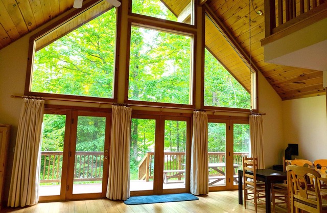 3BR Riverfront Log Home with Steam Sauna, Soaring Glass Wall & Private Forest