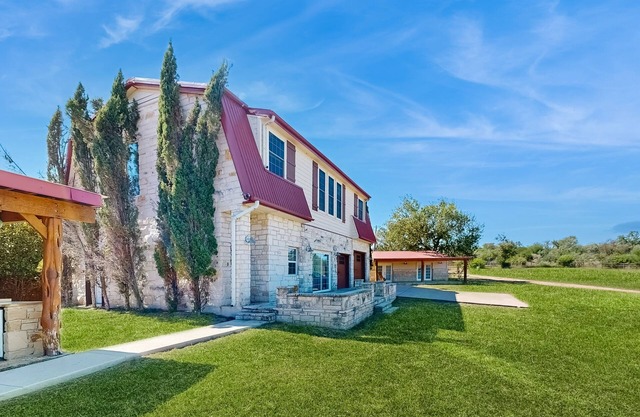 4-bedroom spacious home with guest house & pool, located on 9 acres of land