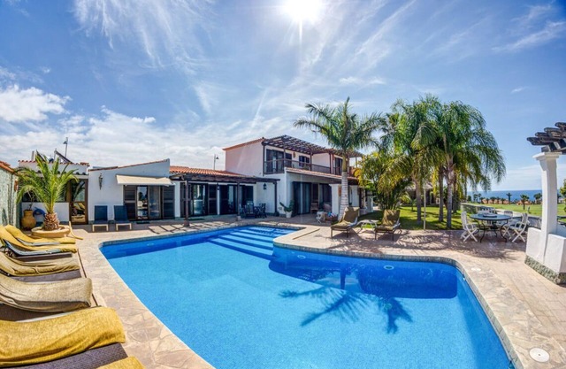 6 bed villa with stunning views - solar heated pool - 10 mins walk to the marina