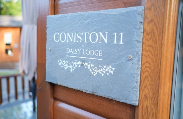 A beautiful Cabin on the 5 star White Cross Bay in a quiet area of the park -
