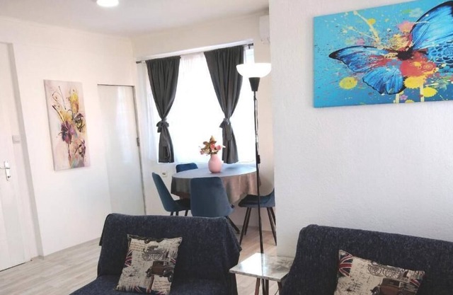 A clean and comfortable apartment with private parking and balcony.