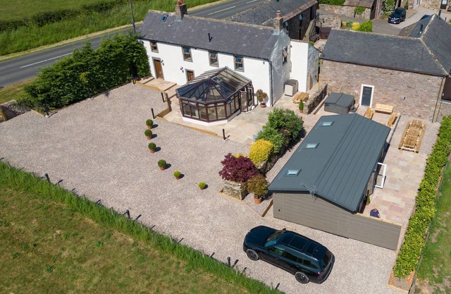 A cottage that sleeps 12 guests in 6 bedrooms