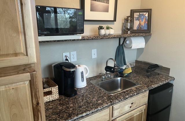 A cute and functional space located on beautiful 2.5 acres