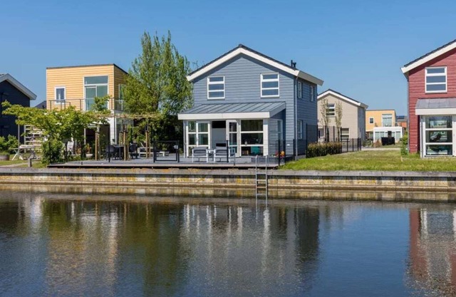 A panorama of water and nature at this comfortable dyke house!