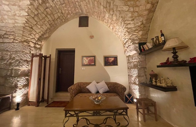 A renovated historic rock house with two vaults