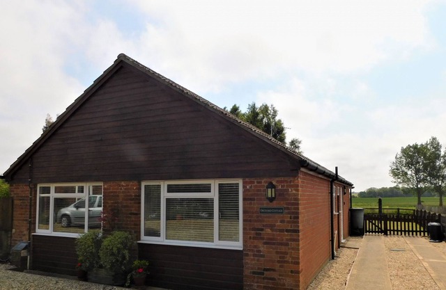 A spacious bungalow, situated in a quiet, rural location, perfect for leisurely walks & fabulous fo