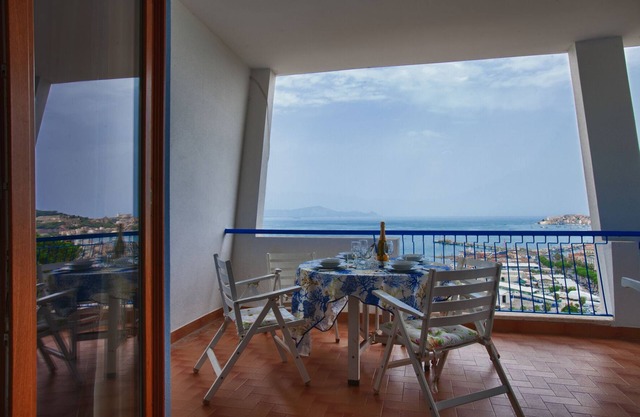A terrace overlooking the gulf. Stylishly furnished apartment for relaxing days.