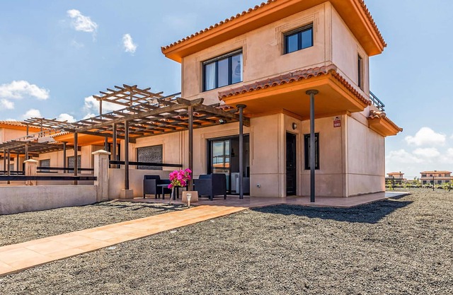 A two-storey cottage with terrace and relaxed atmosphere.